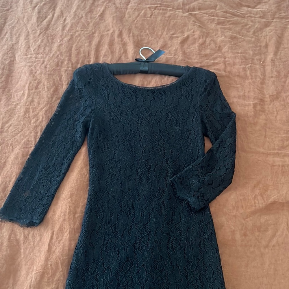 Tally’s Bavarian black lace dress.